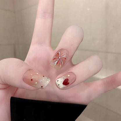 Künstlerisches Press-On Nagel-Kunstset mit floralen und Glitzerakzenten