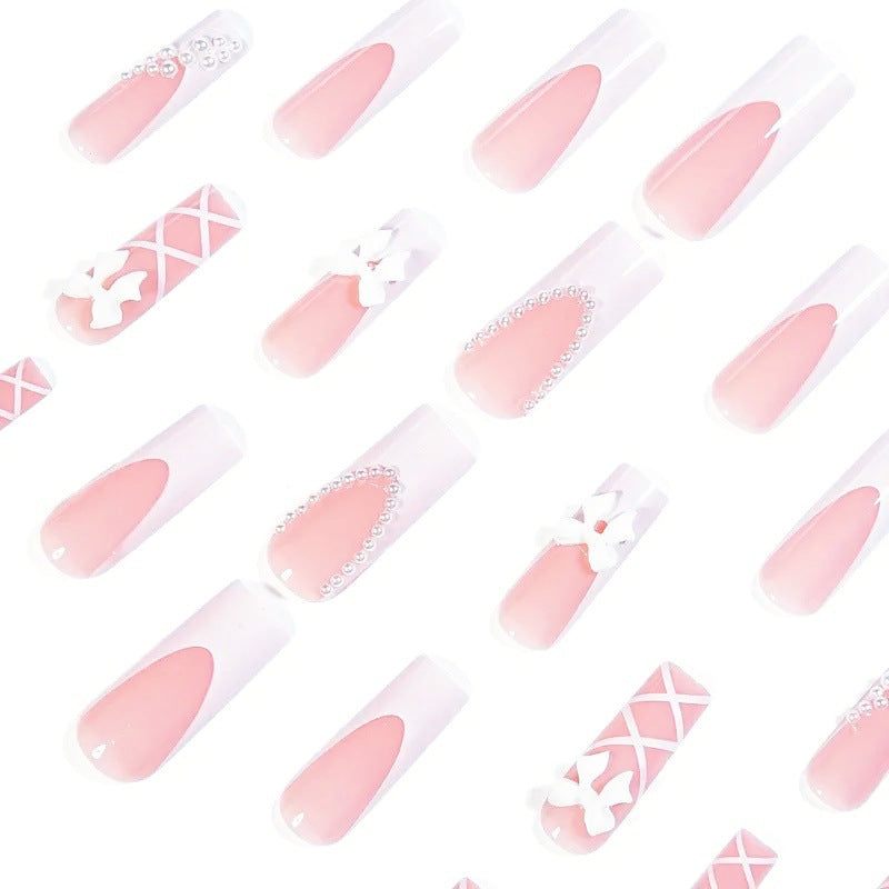 Kunstnagelset mit eleganten 3D- Schleifen und Perlenverzierungen Brehn