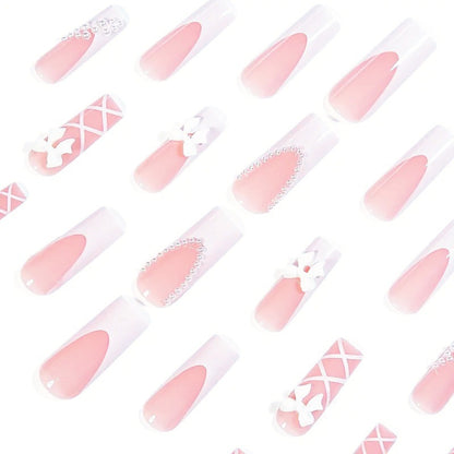 Kunstnagelset mit eleganten 3D- Schleifen und Perlenverzierungen Brehn