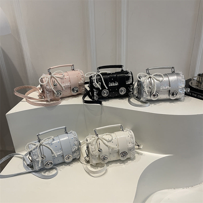 Dekorative kompakte Handtasche