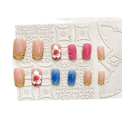Künstlerisches Press-On-Nagelset mit floralen und Wellenmotiven Brehn