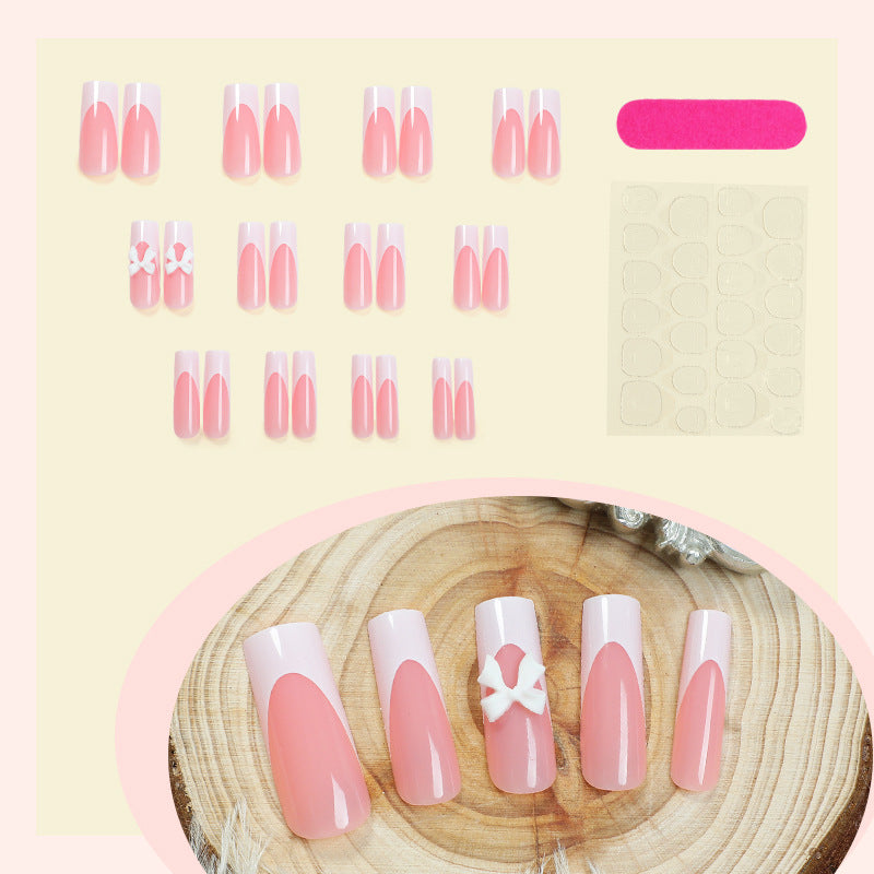 Elegantes Press-On Nagelset mit dekorativen Schleifen Brehn