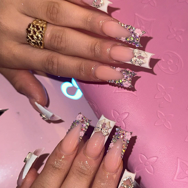 Kunstnagelset mit glamourösen 3D-Blumenverzierungen Brehn