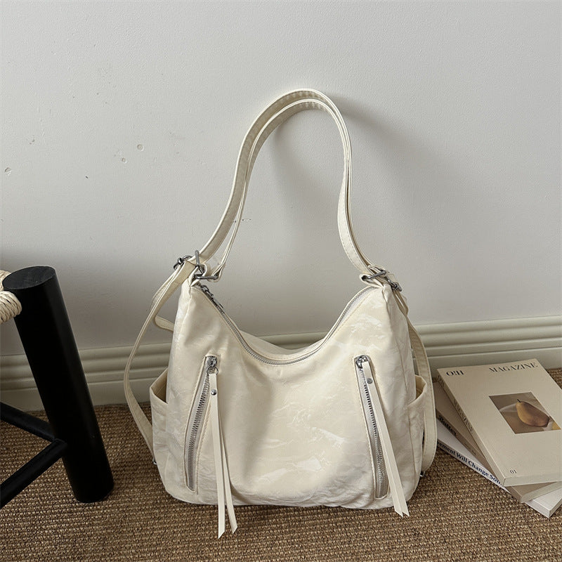 Vielseitige strukturierte Hobo-Tasche