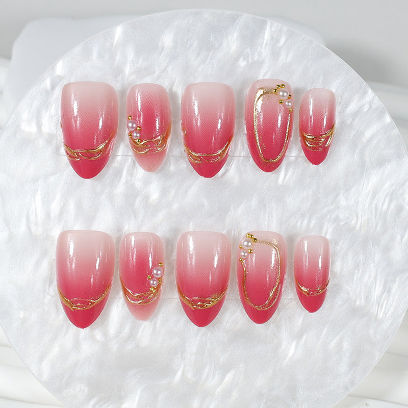 Kunstnagelset mit eleganten Ombré-Designs und Glitzerakzenten Brehn