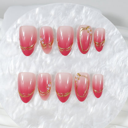 Kunstnagelset mit eleganten Ombré-Designs und Glitzerakzenten Brehn