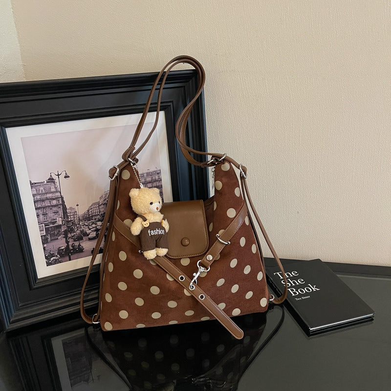 Modische gepunktete Schultertasche