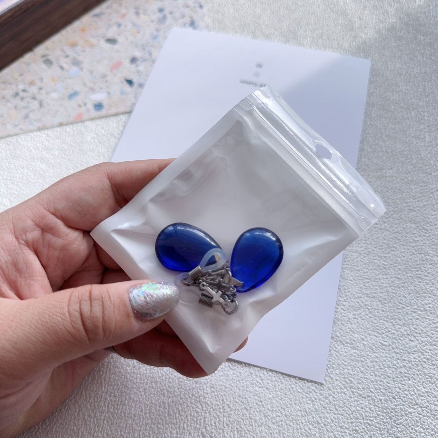 Elegante Tropfenohrringe mit Kettendetail Brehn