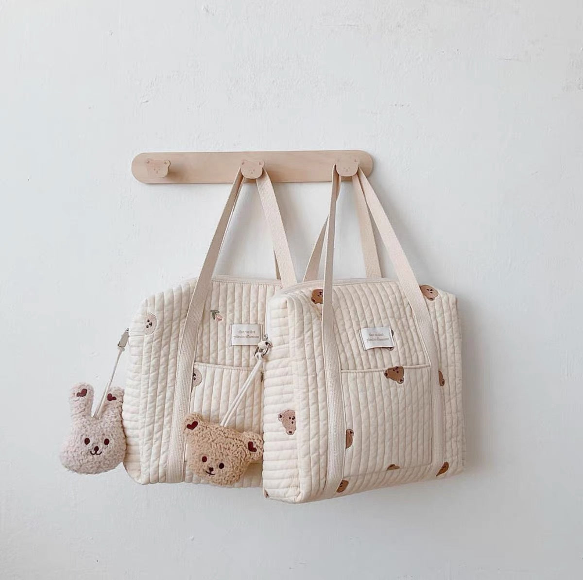Gestepptes wandelbare Wickelrucksack mit gesticktem Tierapplikation und Kinderwagenhaken