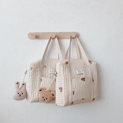 Gestepptes wandelbare Wickelrucksack mit gesticktem Tierapplikation und Kinderwagenhaken