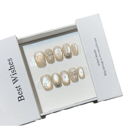Elegantes mit Schleifen verziertes Press-On Nail Art Set Brehn