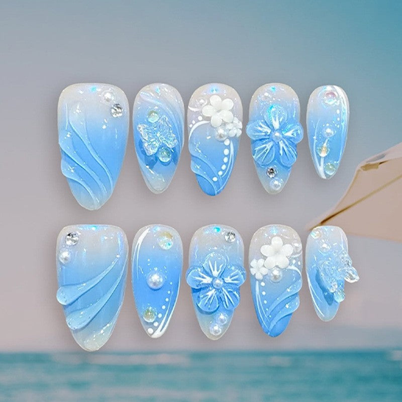 Kreatives Kunstnagelset mit maritimen Akzenten Brehn