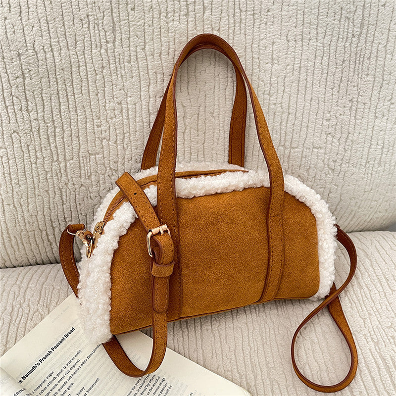 Gemütliche Kunstwildlederhandtasche