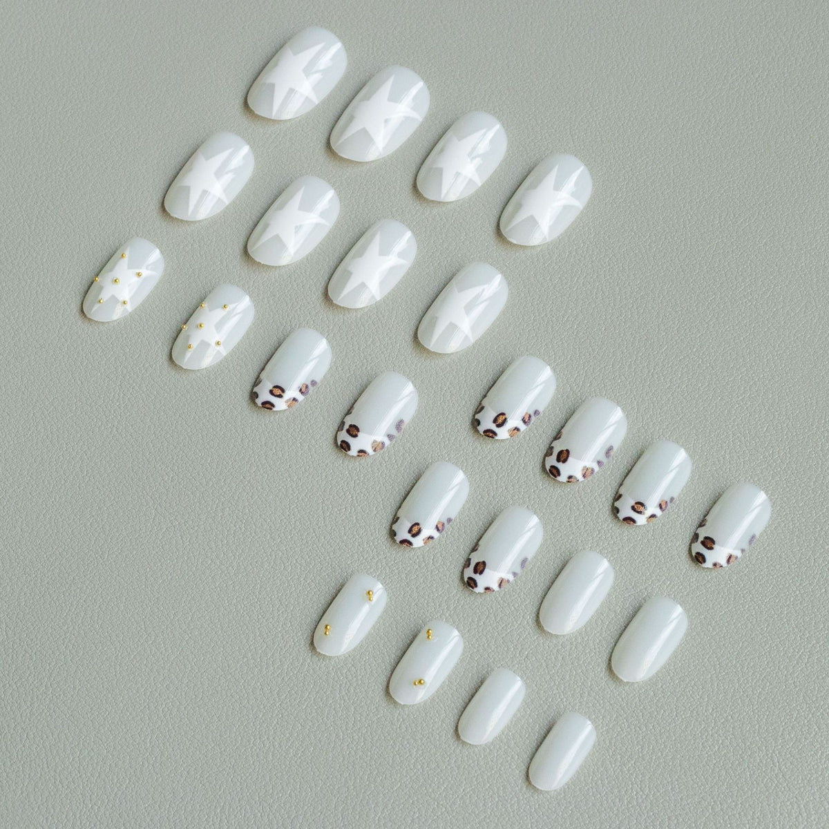 Künstlerisches Leopardenmuster und Stern Nageldesign Set