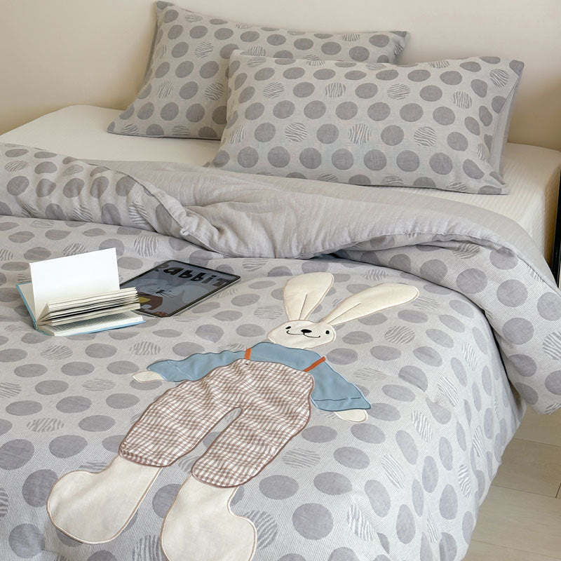 Kinder-Steppbett-Garnitur mit appliziertem Hunde-Motiv und Tupfenmuster