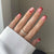 Künstlerisches Herz-Design Press-On Nagelset Brehn