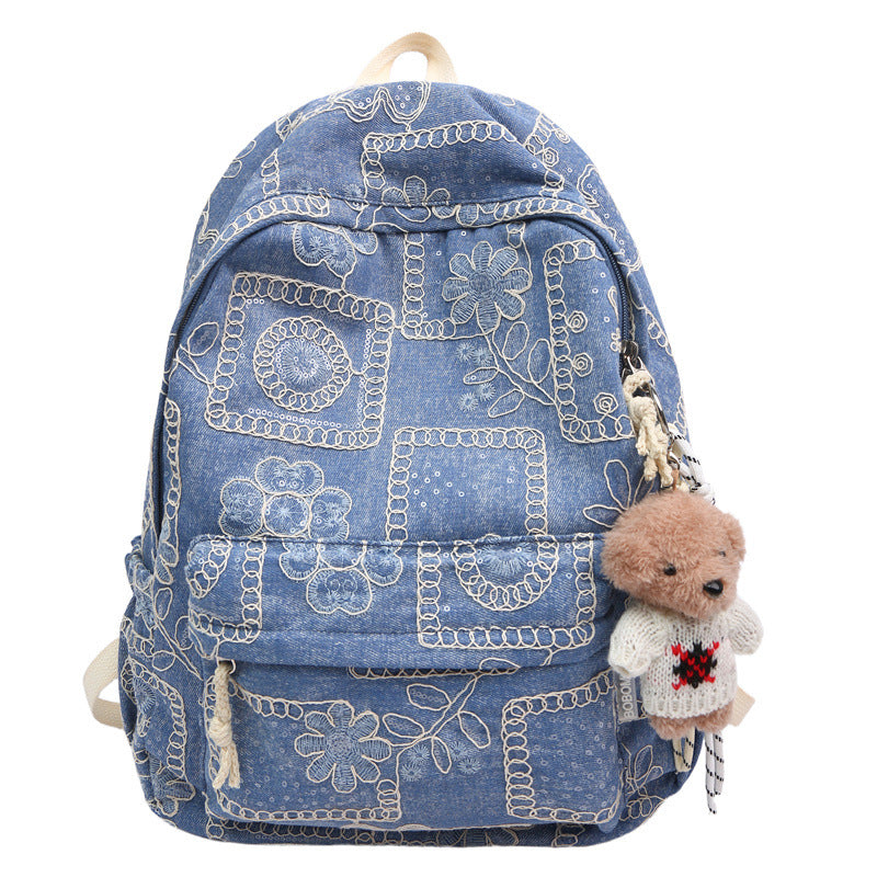 Blumenbestickter Denim-Rucksack