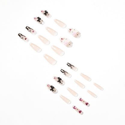 Kunstvolle Nagelverlängerungen mit Hello Kitty und floralen Akzenten Brehn