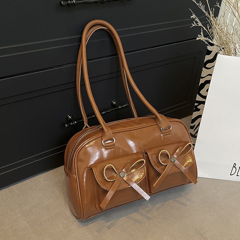 Stilvolle multifunktionale Handtasche mit Schleifendetail Brehn