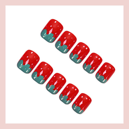 Kunstnagelset mit fröhlichen Erdbeerdesigns Brehn