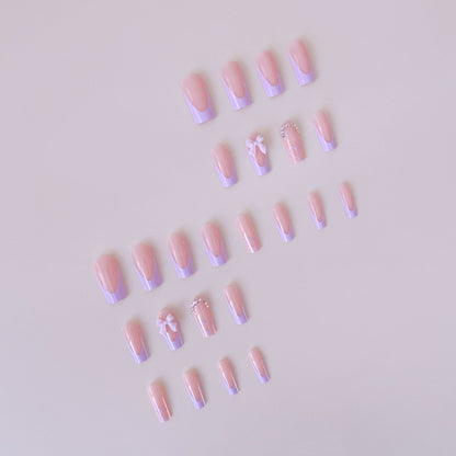 Kunstnagelset mit eleganten 3D-Schleifen und Glitzerdetails Brehn