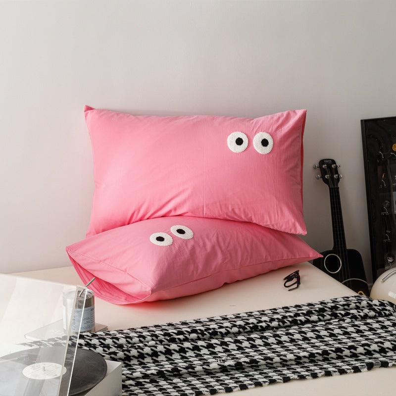 Verspieltes Kissenbezug-Set mit bestickten Augen-Applikationen aus weichem Baumwollstoff