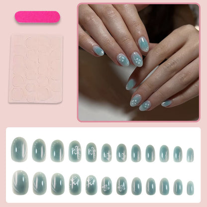 Kunstnagelset mit floralen Verzierungen und glanzvollem Finish Brehn