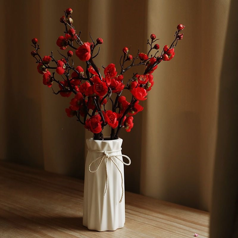 Dekorative Blumenäste Arrangement