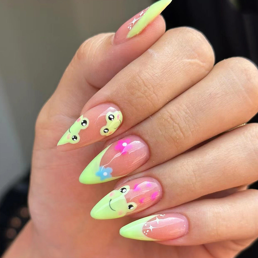 Kunstnagelset mit kreativen Froschmotiven und verspielten Akzenten Brehn