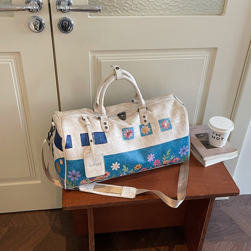 Künstlerische Blumenmuster Wochenendtasche