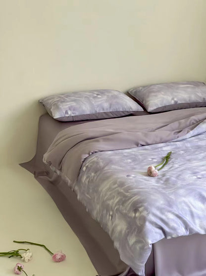 Bettwäsche-Set aus Satin mit sanftem Ombre-Farbverlauf und seidig-mattem Griff