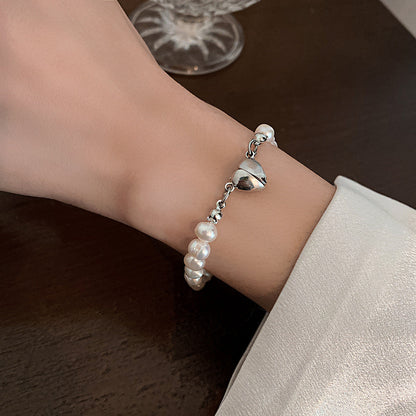 Elegantes Silberperlenarmband mit Herzdetails Brehn
