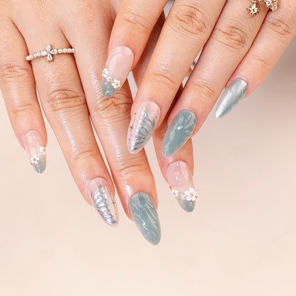 Kunstvolle Stiletto-Nägel mit floralem und dekorativem Design Brehn