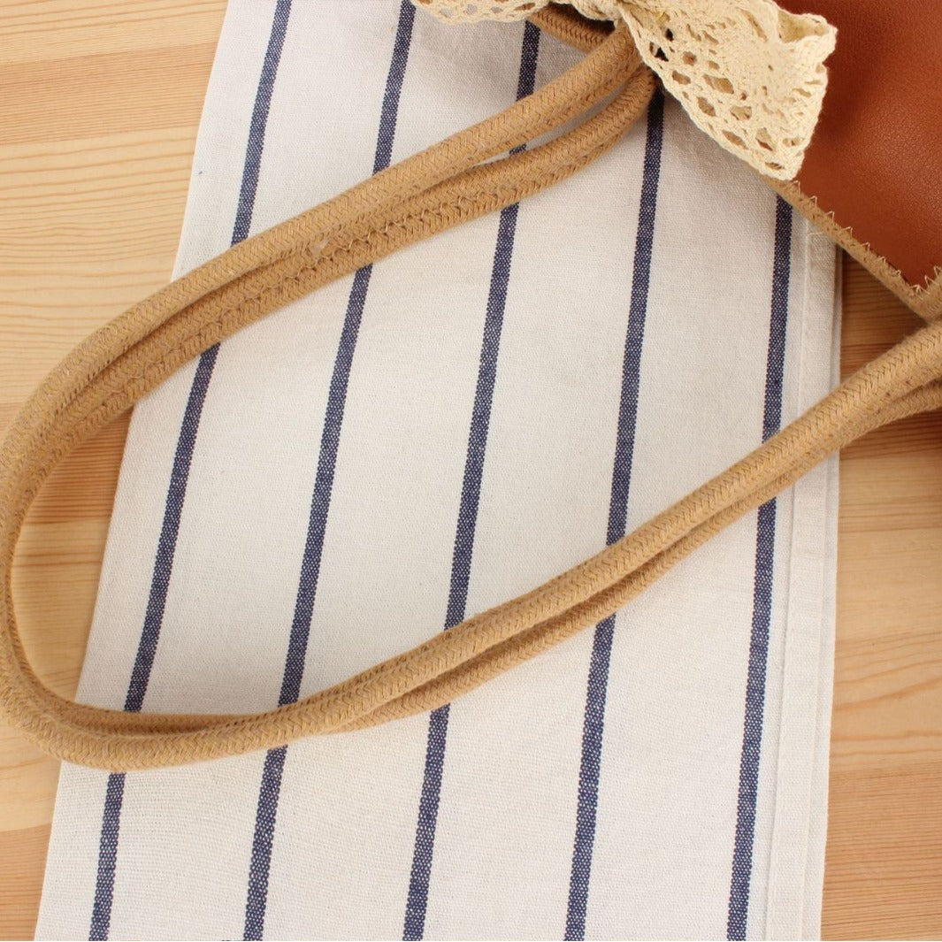 Elegante Bast-Umhängetasche mit Lederdetails Brehn