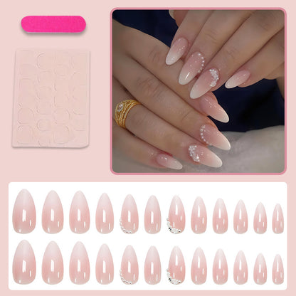 Kunstnagelset mit eleganten Ombre-Effekten und Glitzerakzenten Brehn