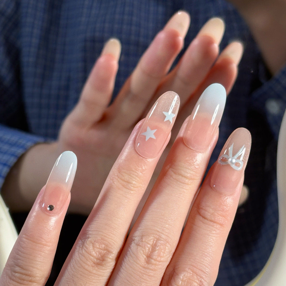 Glamouröse Ombre Press-On Nagelset mit dekorativen Stern- und Schleifenakzenten Brehn