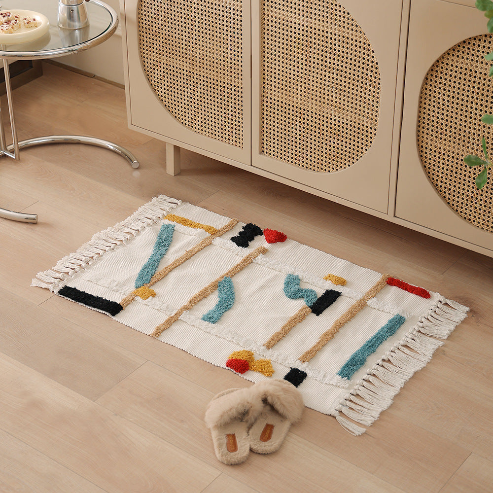 Gewebter Vorleger im Boho-Minimalstil mit kontrastiertem Tufting und Baumwollfransen Brehn