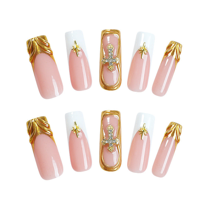 Kreatives Kunstnagelset mit glitzernden Goldverzierungen Brehn