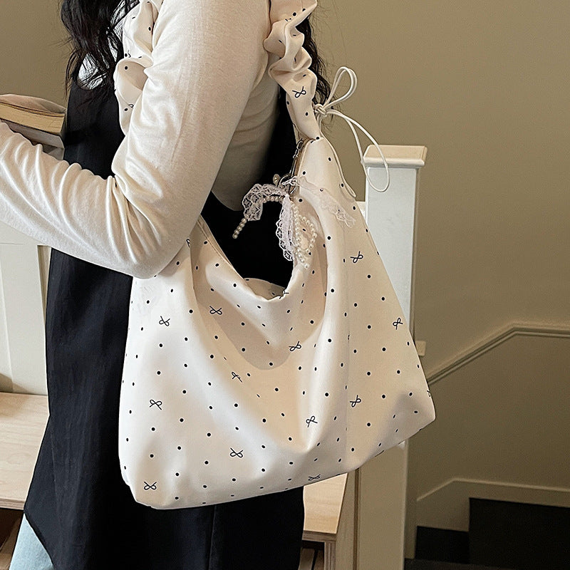 Lässige gepunktete schlabberige Handtasche
