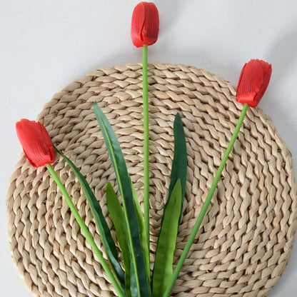Dekorative Kunsttulpenstielarrangement