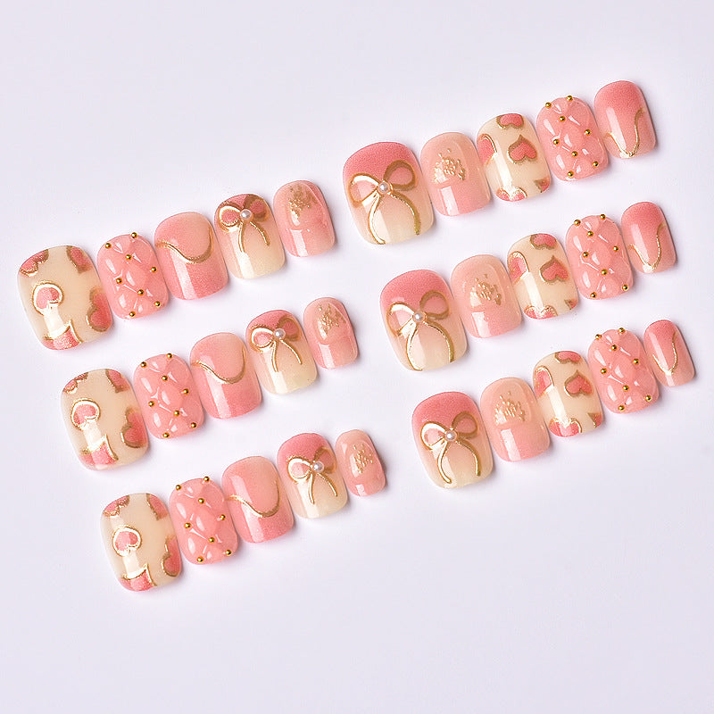 Elegantes Herz- und Band-Thema Press-On Nagelset Brehn