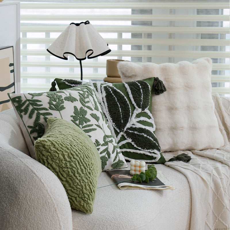 Quadratisches Zierkissen mit erhabenem Blatt‑Tufting und Quasten Brehn