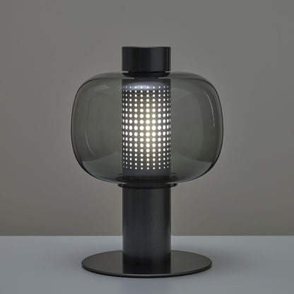 Künstlerische Tischlampe mit elegantem Glasschirm
