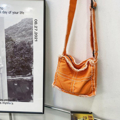 Lässige Fransen-Denim-Schultertasche