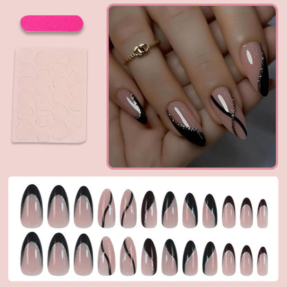 Kunstnagelset mit elegantem Schwarzweiß-Design und Glitzerakzenten Brehn