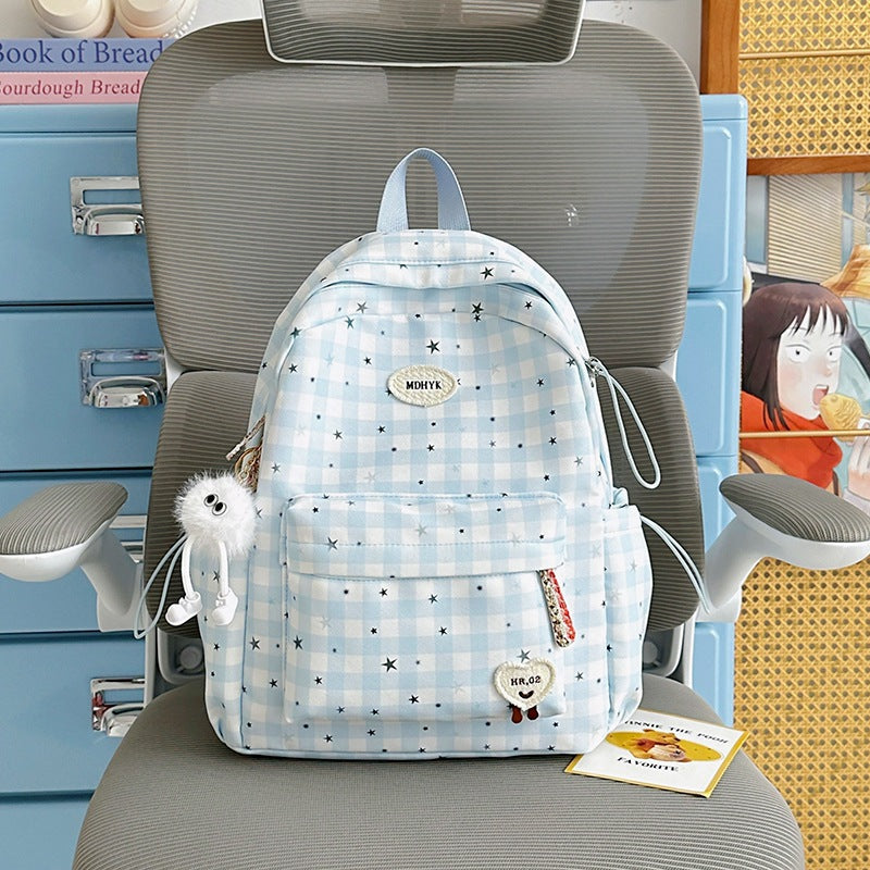 Süßer gemusterter Schulrucksack