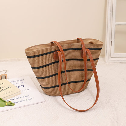 Elegante Bast-Handtasche mit Ledergriffen Brehn