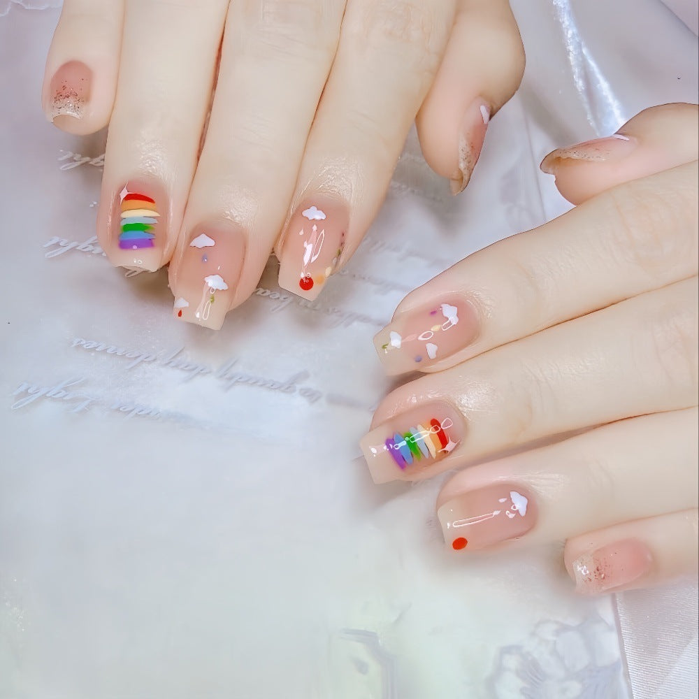 Kreatives Kunstnägel Set mit Regenbogen- und Wolkenmotiven Brehn