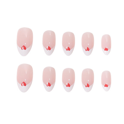 Herzgeschmücktes French Tip Nagelset Brehn