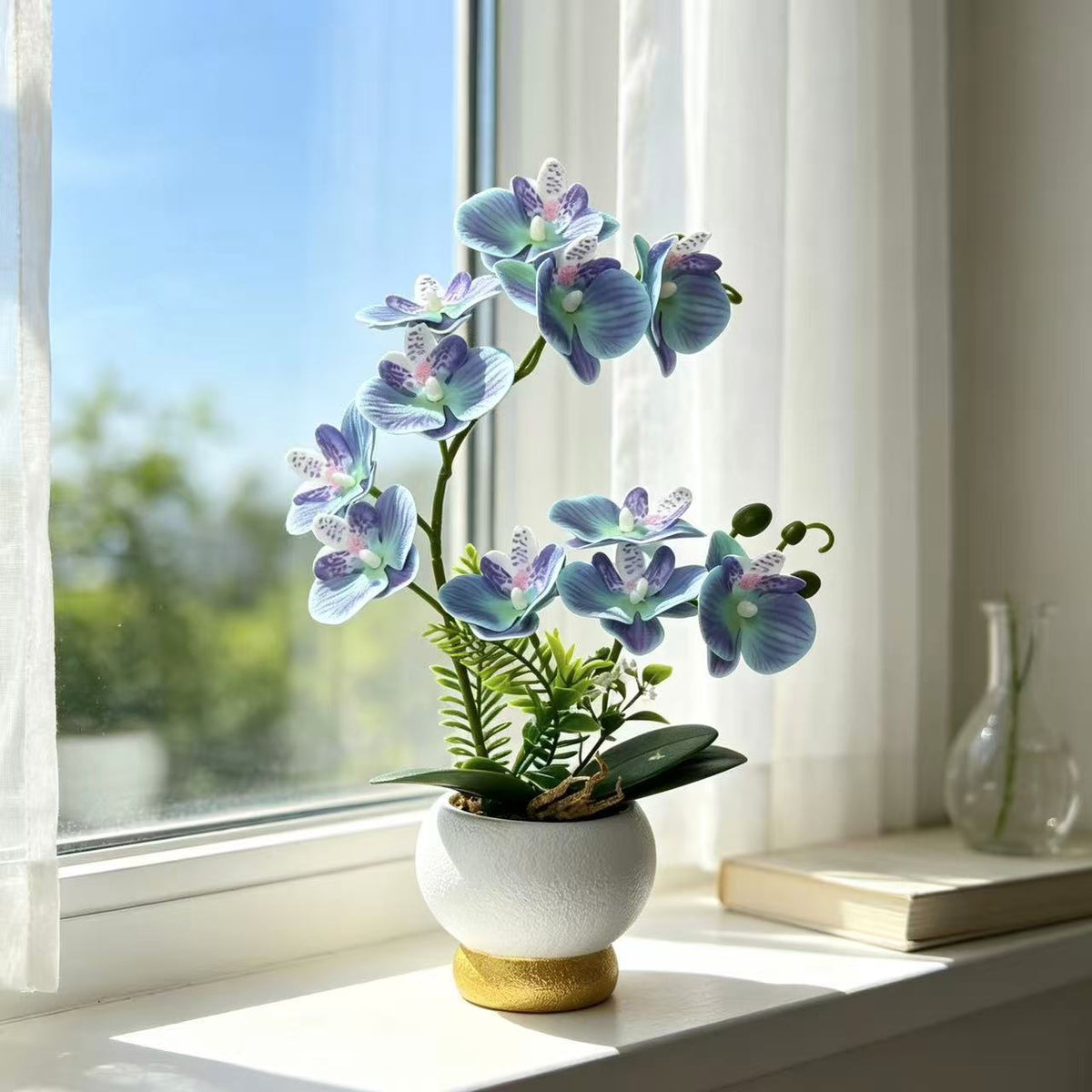 Künstliche Orchideenarrangement für Tischdekoration